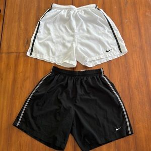 NIKE - Womens soccer shorts. Colors white and black. Size S.